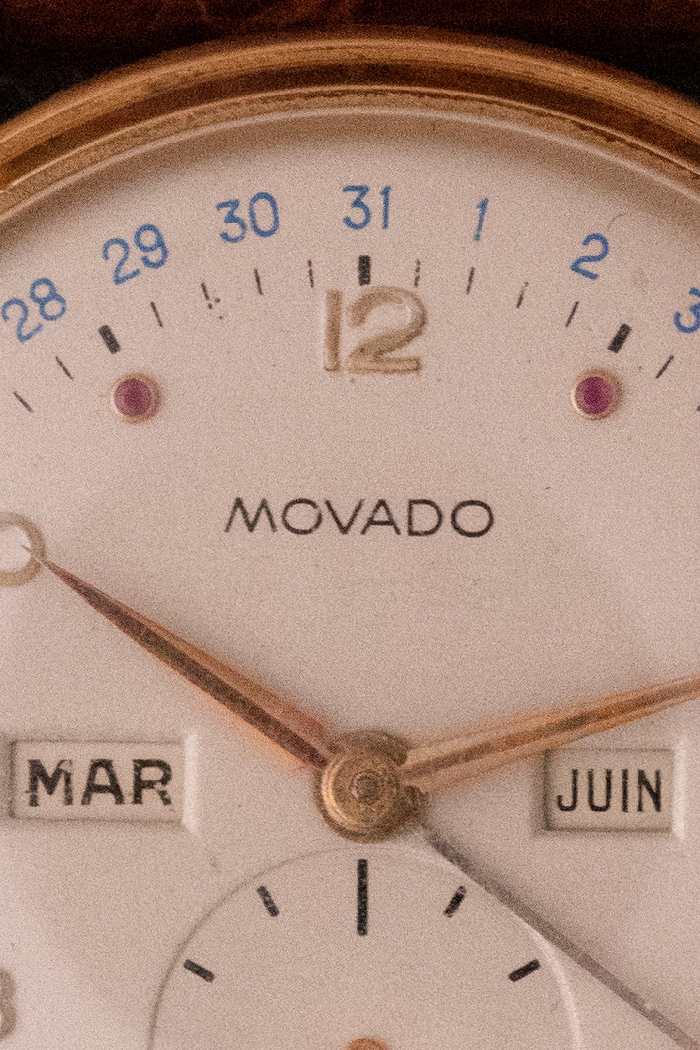 Movado triple date